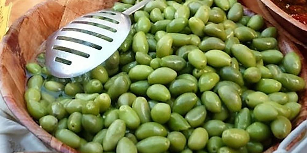 The famous picholine olive, with its delicate hazelnut flavor, is juicy and slightly crunchy. – © Thierry Decupere The famous picholine olive, with its delicate hazelnut flavor, is juicy and slightly crunchy. – © Thierry Decupere