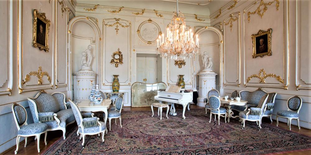 The first room of the Archbishops' Summer Apartment, so called Music Salon or the Reception Room. It is furnished in the Second Rococo style and it is connected with three more rooms of the Summer Apartment and a bathroom. – © Tomas Vrtal The first room of the Archbishops' Summer Apartment, so called Music Salon or the Reception Room. It is furnished in the Second Rococo style and it is connected with three more rooms of the Summer Apartment and a bathroom. – © Tomas Vrtal