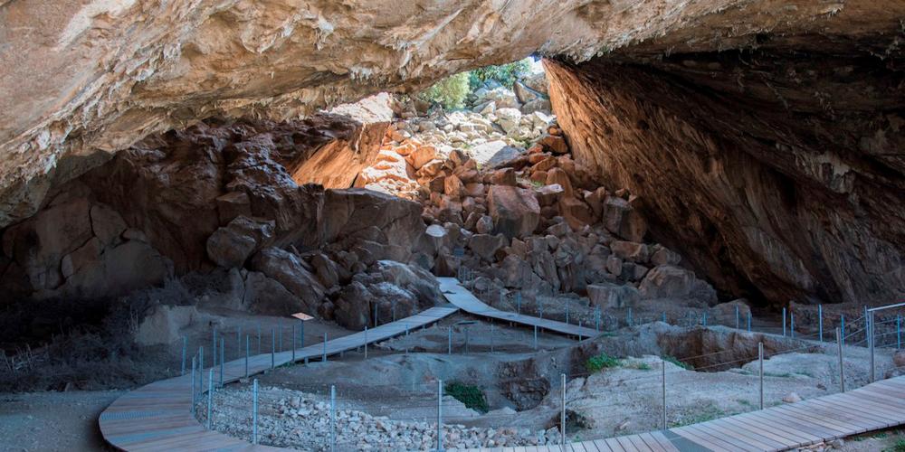 The entrance to the Franchthi Cave. – © Hellenic Ministry of Culture and Sports / Ephorate of Antiquities of Argolida The entrance to the Franchthi Cave. – © Hellenic Ministry of Culture and Sports / Ephorate of Antiquities of Argolida