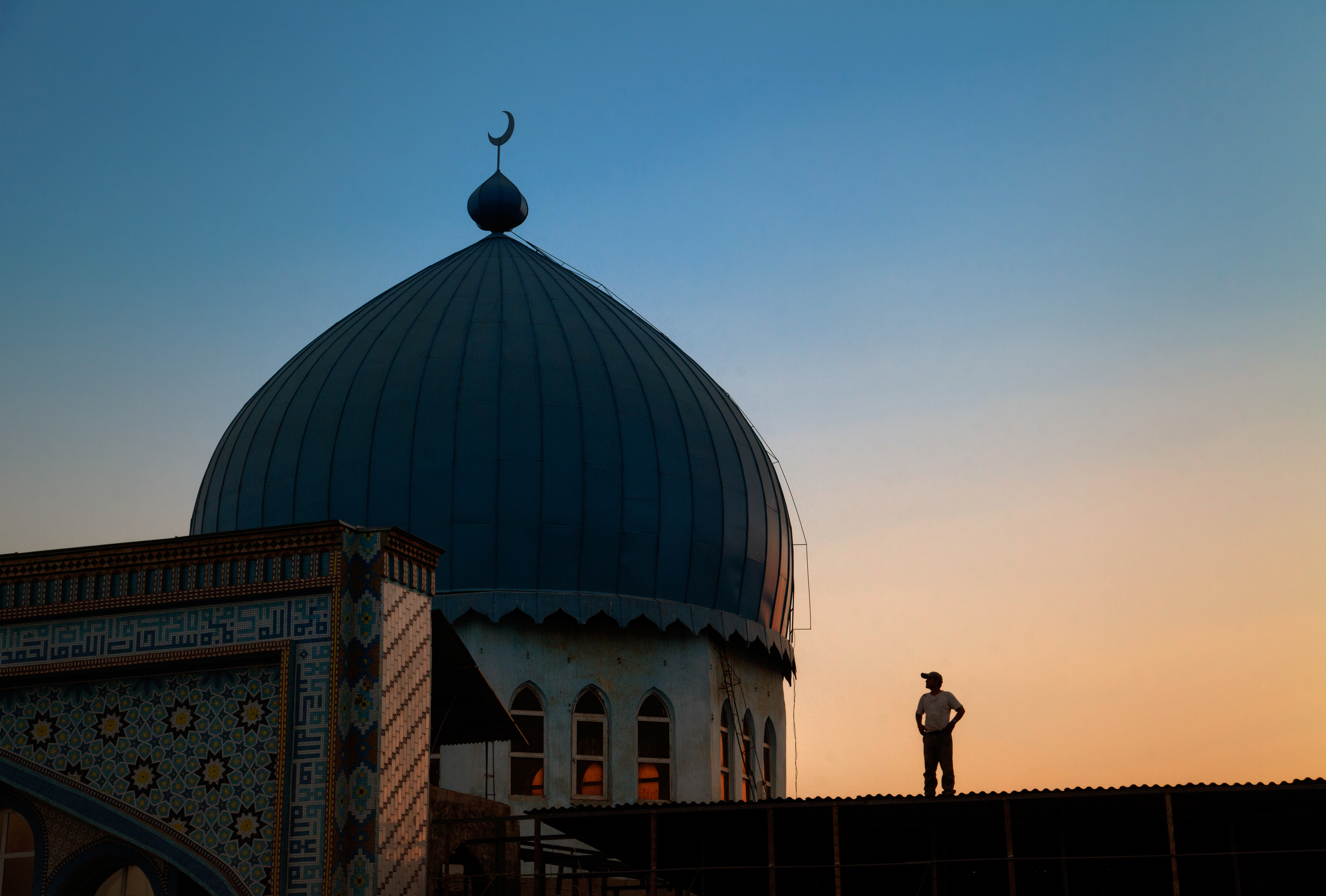 Visitor exploring the rooftops of Dushanbe, Tajikistan - Photo credit: Yury Birukov / Shutterstock.com