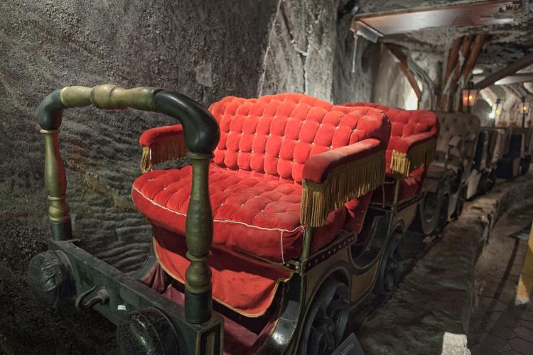 No-longer functional carriage of tourist horse-drawn railway from the 19th century, built especially for top state authorities. Museum in the Wieliczka Salt Mine. – © Bartek Papież