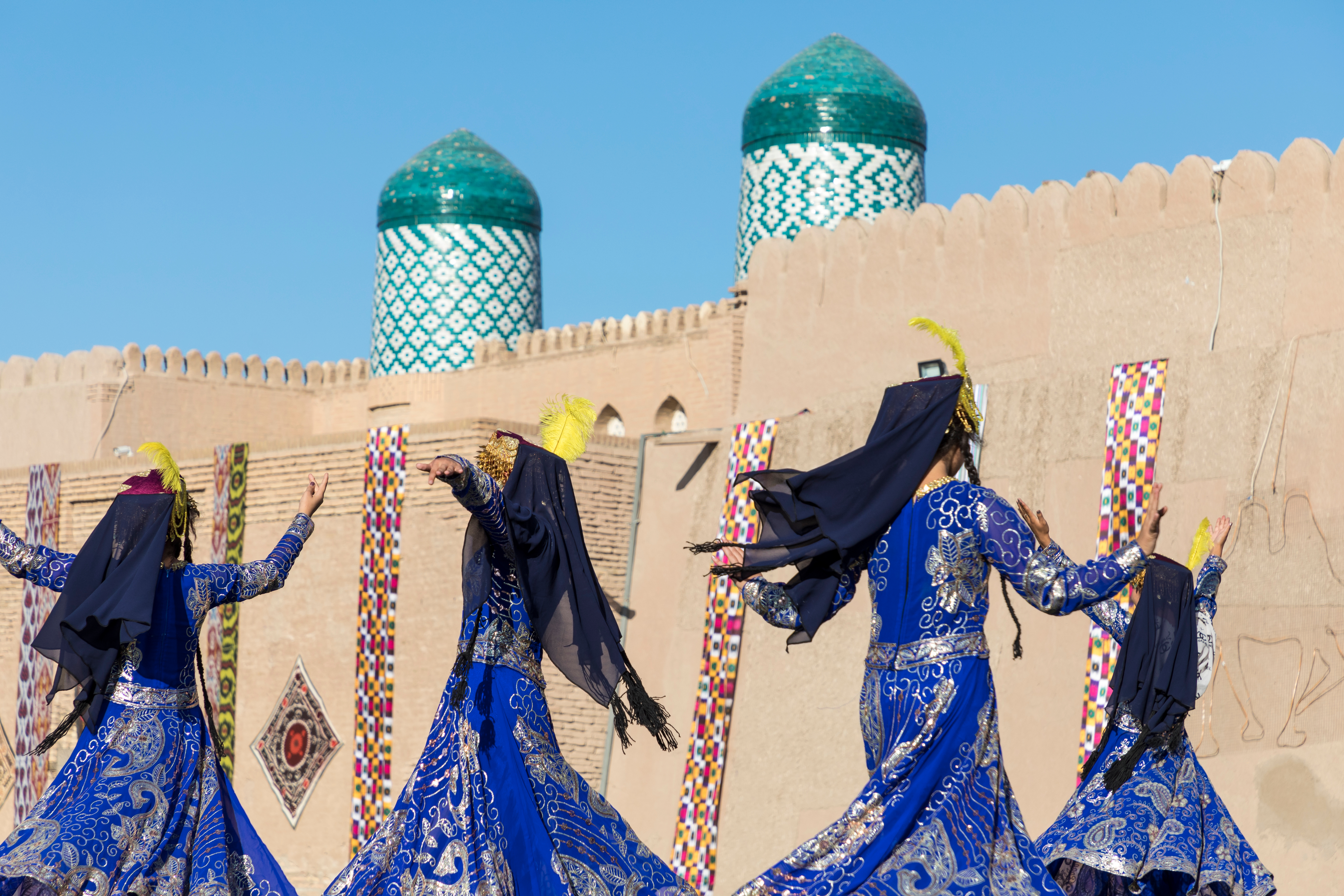 Traditional folk dancers at local festival in Khiva – © Curioso.Photography / Shutterstock Traditional folk dancers at local festival in Khiva – © Curioso.Photography / Shutterstock