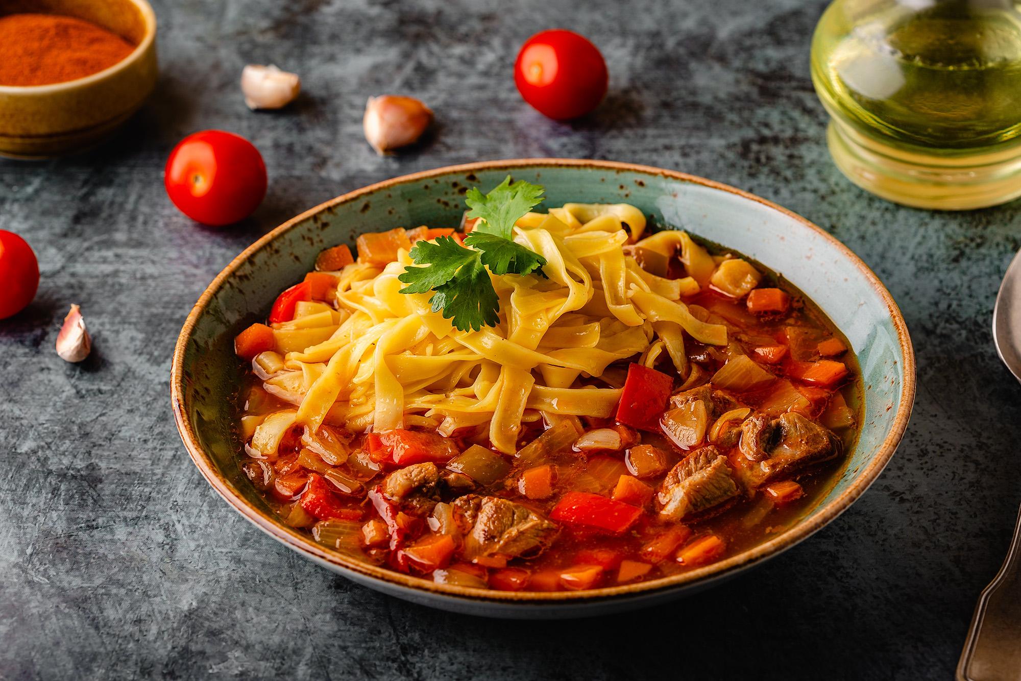 A traditional Central Asian soup with noodles, lamb, and vegetables – © Tatiana Bralnina / Shutterstock