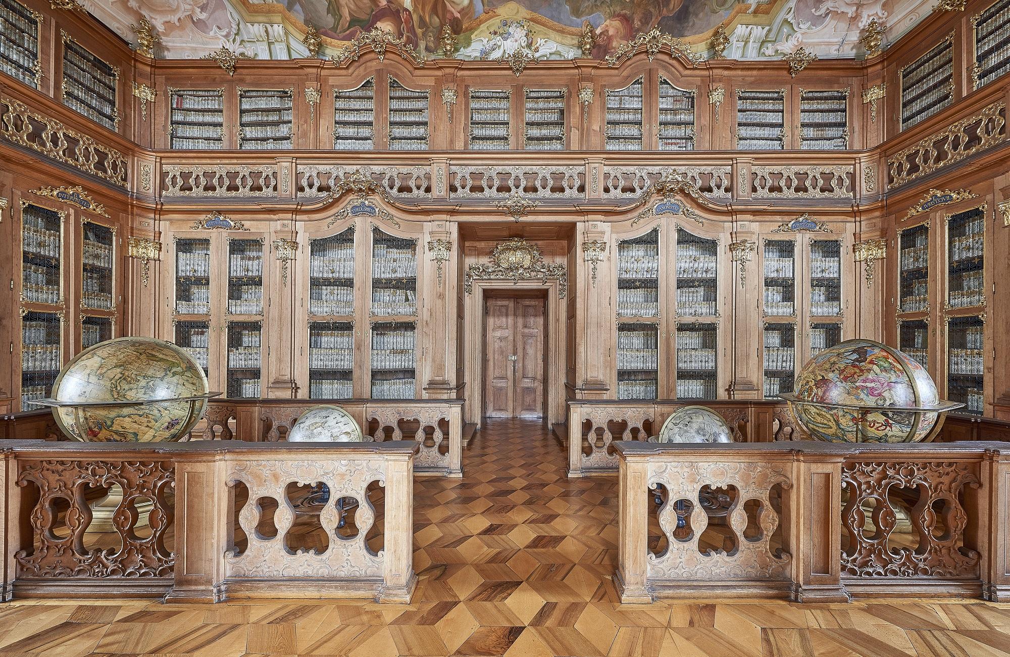 Founded by Bishop Karl von Liechtenstein-Castelcorno around 1694, the palace library is the largest and most valuable historical library in the Czech Republic. - © Tomas Vrtal