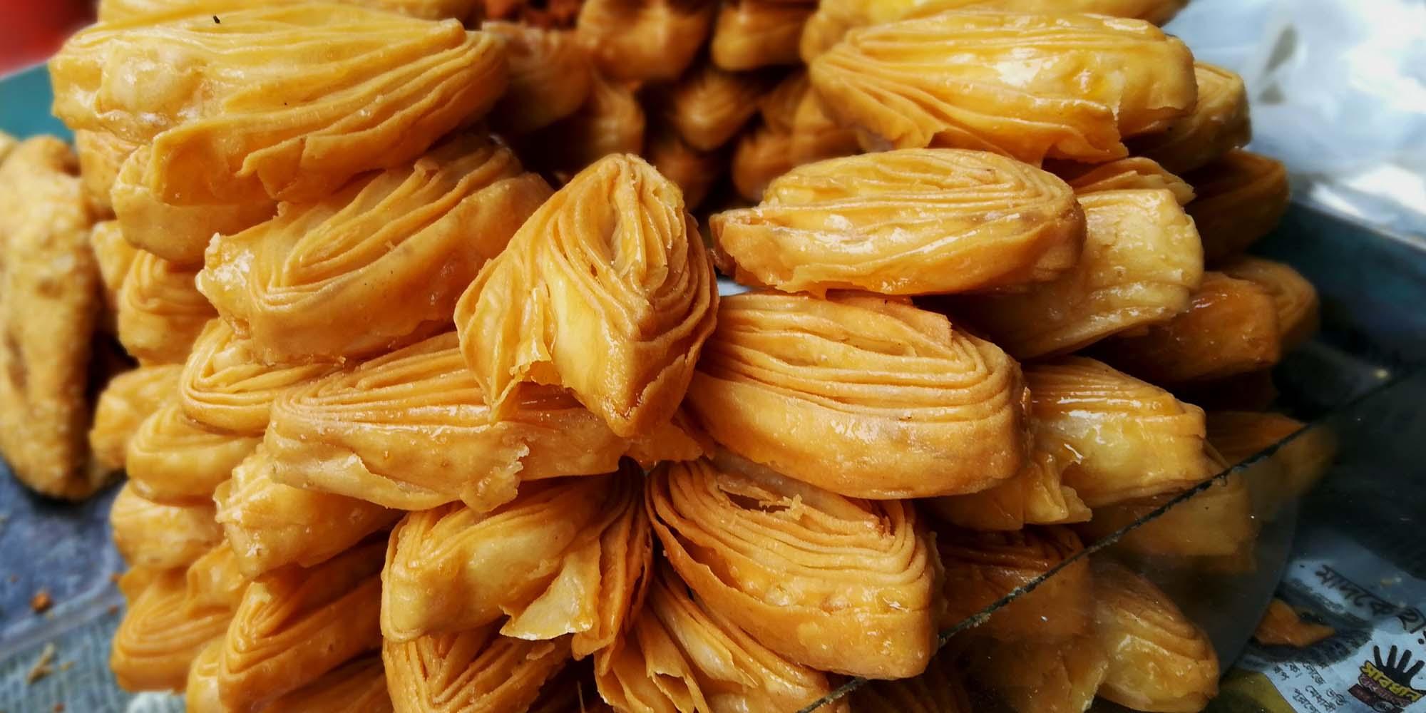 Local handmade Goja sweets at Paharpur Bazar, Paharpur – © Roni Kabir Nurul