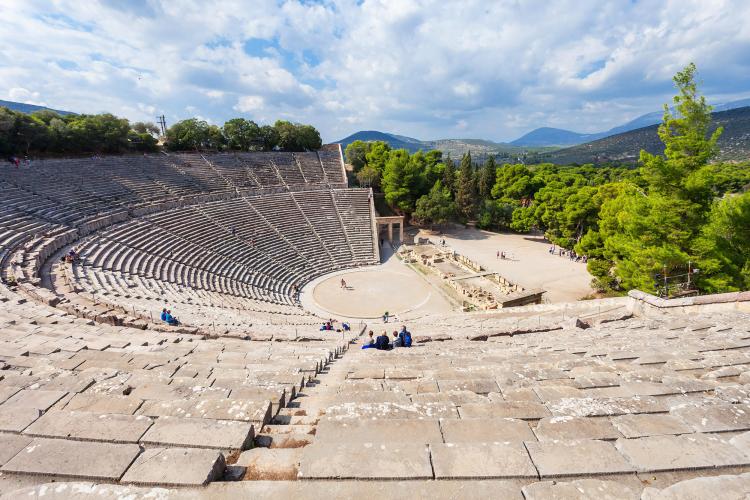 The Epidaurus Ancient Theatre is dedicated to the ancient Greek God of medicine, Asclepius. â€“ Â© saiko3p / Shutterstock
