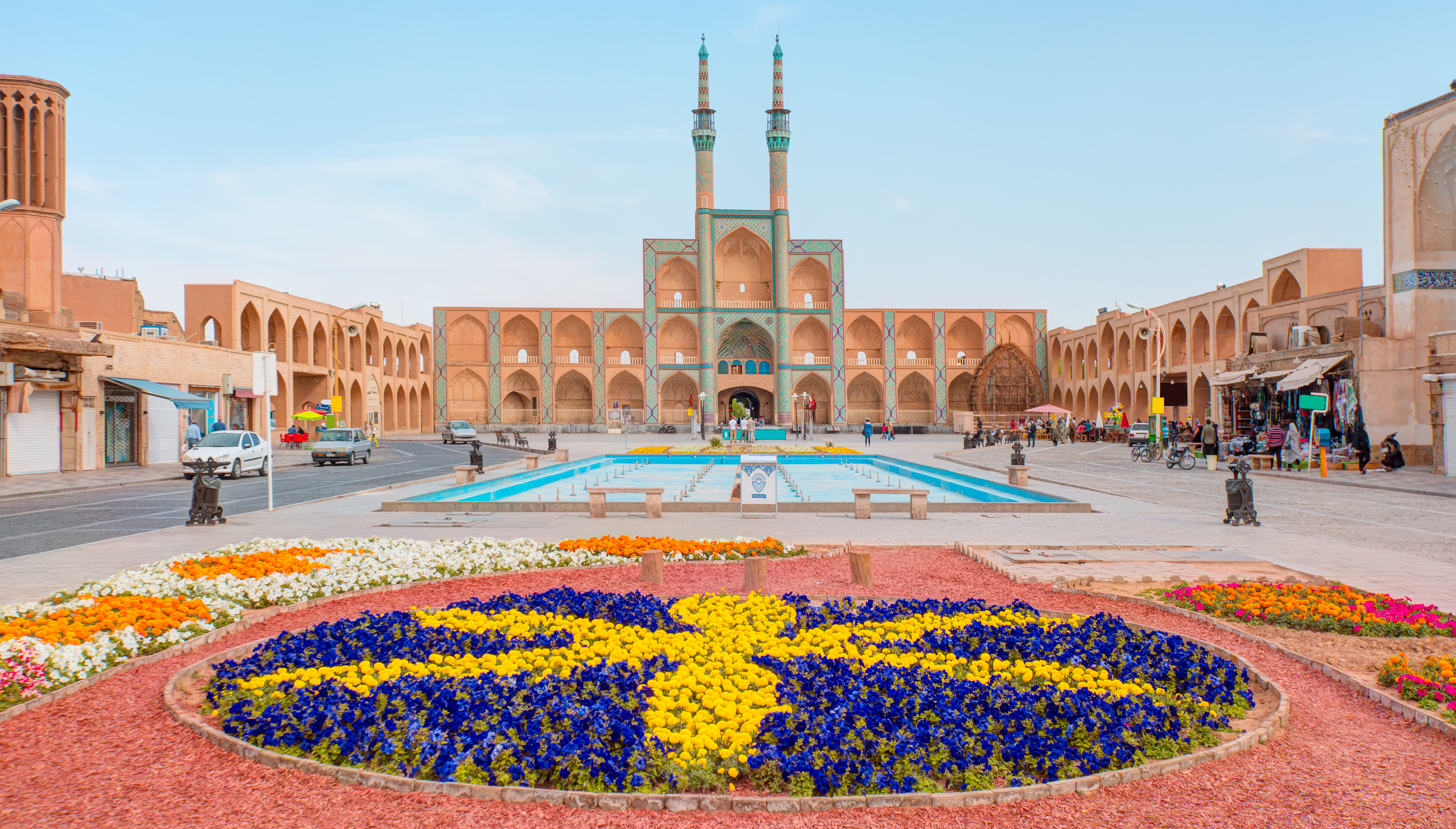 Colourful flowers installation in the square, Amir Chakhmaq Complex. – © muratart / Shutterstock