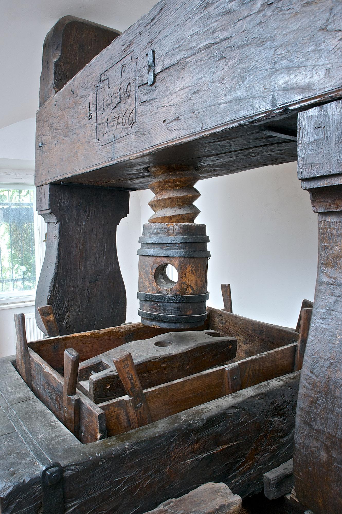The museum houses a unique collection of wine presses, the oldest of which is a monumental spindle press from 1719, which stands 280 cm (9 feet) tall. – © Dominika Švédová