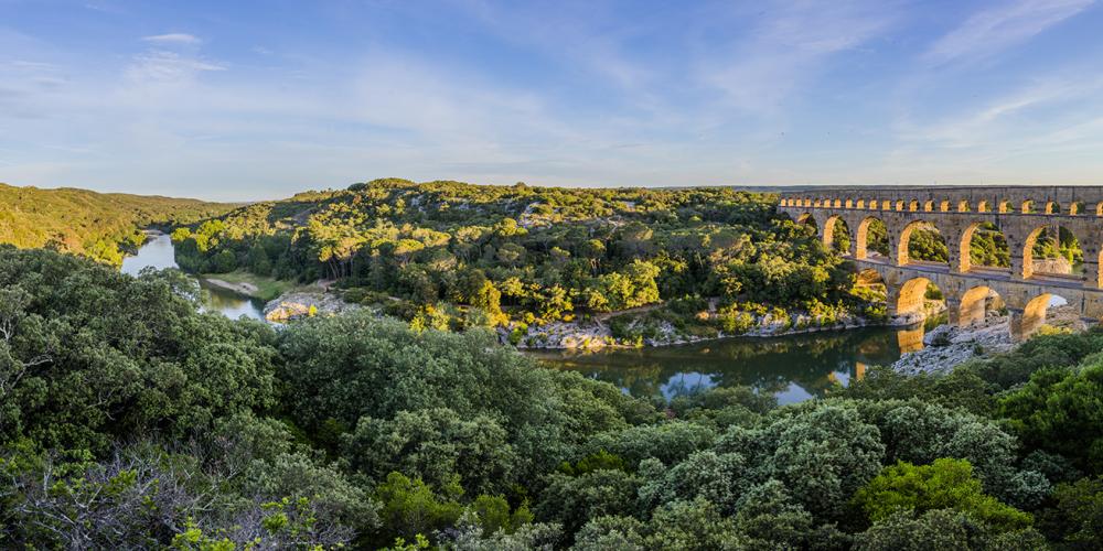 A panoramic view of the Site du Pont du Gard, which is considered to be among the best-preserved Roman aqueducts and a wonder of ancient construction. – © Aurelio Rodriguez A panoramic view of the Site du Pont du Gard, which is considered to be among the best-preserved Roman aqueducts and a wonder of ancient construction. – © Aurelio Rodriguez
