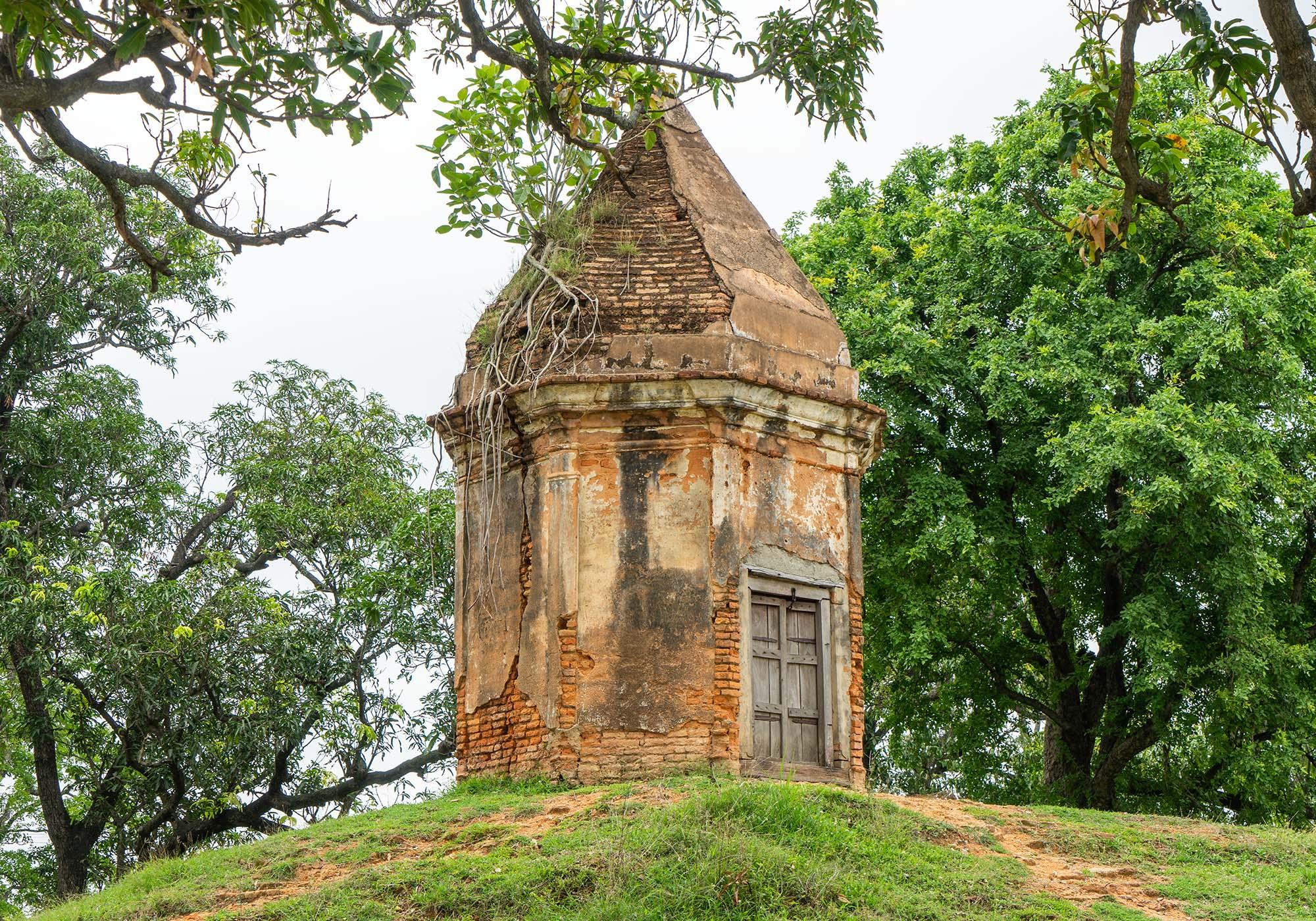 The Rahula Stupa has an octagonal Shiva temple on top of it that was built much later by Hindus. – © Michael Turtle