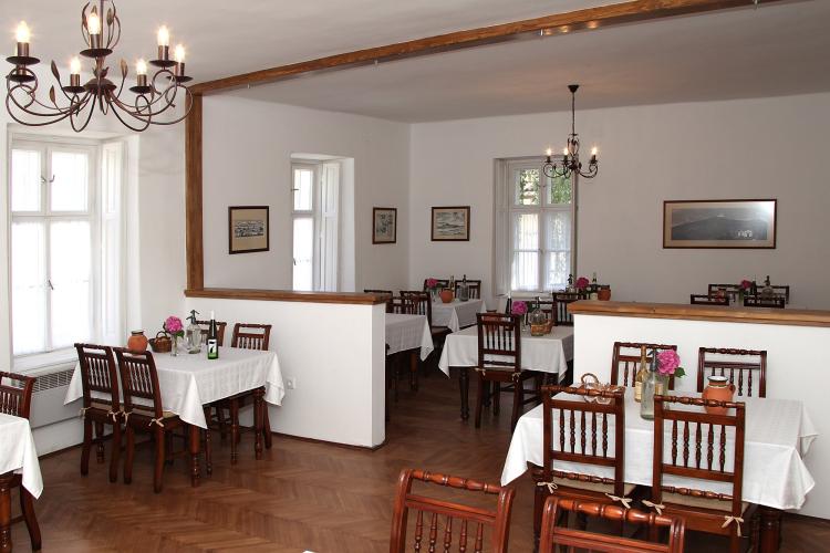 A nice restaurant room in the house-court of Tokaji Rákóczi Cellar. Visitors 
can enjoy wine tasting dinners between these very thick walls that tell 
historical stories to the wine lovers. – © István Meszaros