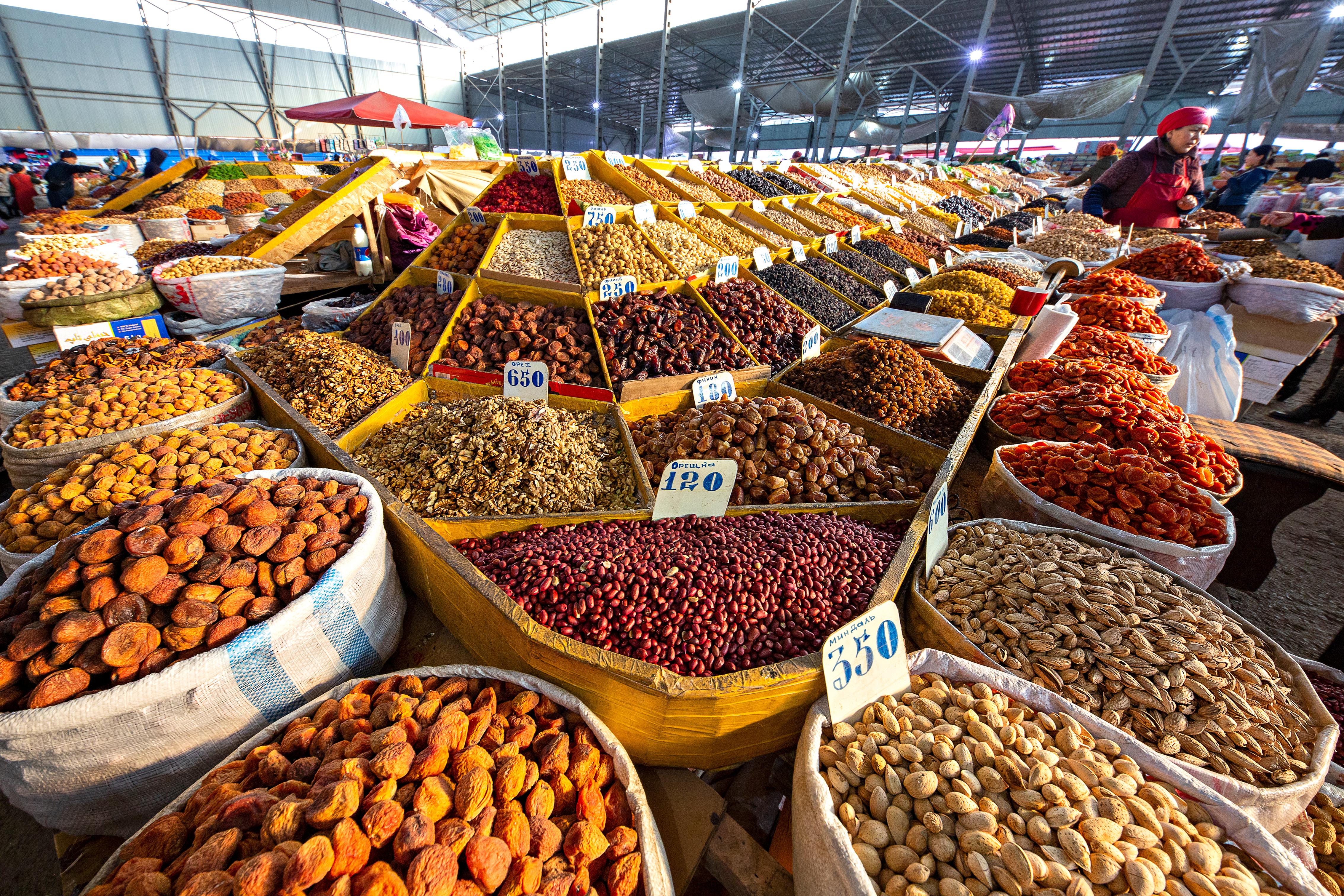 Spices, grains, and dried fruit being sold at the Bazaar - Photo by  MehmetO / Shutterstock.com