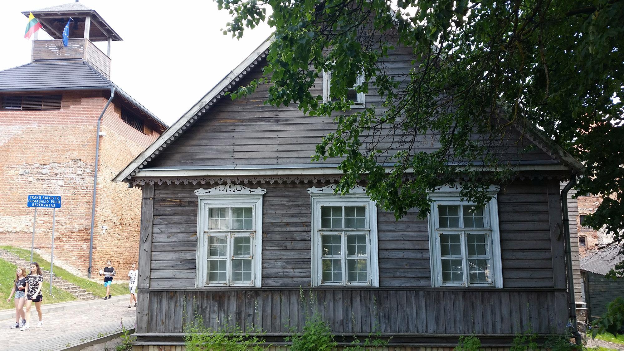 Traditional wooden Karaim houses are seen on the main street in Trakai. - © www.trakai-visit.lt