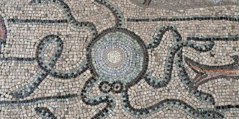 Detail of the mosaic floor of the story of Jonah, with the marine background crowded with fish and other sea creatures – © Gianluca Baronchelli Detail of the mosaic floor of the story of Jonah, with the marine background crowded with fish and other sea creatures – © Gianluca Baronchelli