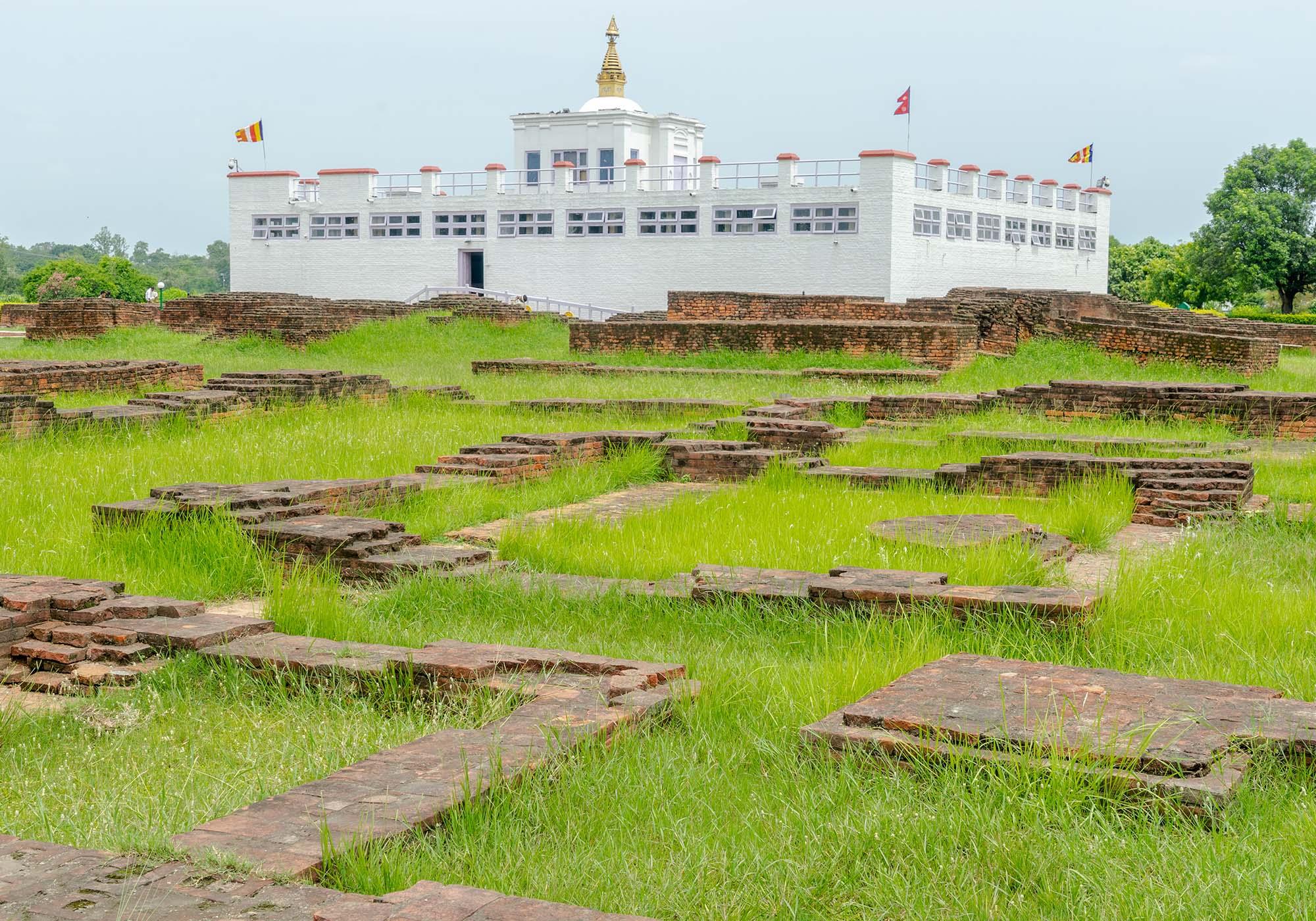 Surrounding the Mayadevi Temple are the foundations of ancient monasteries that were built here for pilgrims as early as the 3rd century BC. – © Michael Turtle