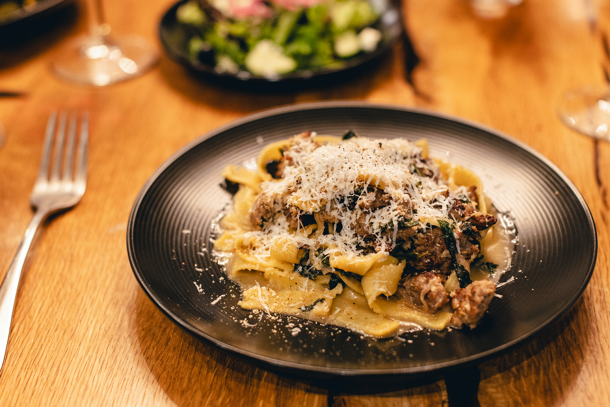 Rich and zesty Fettuccini pairs perfectly with a classic red wine. – FINN