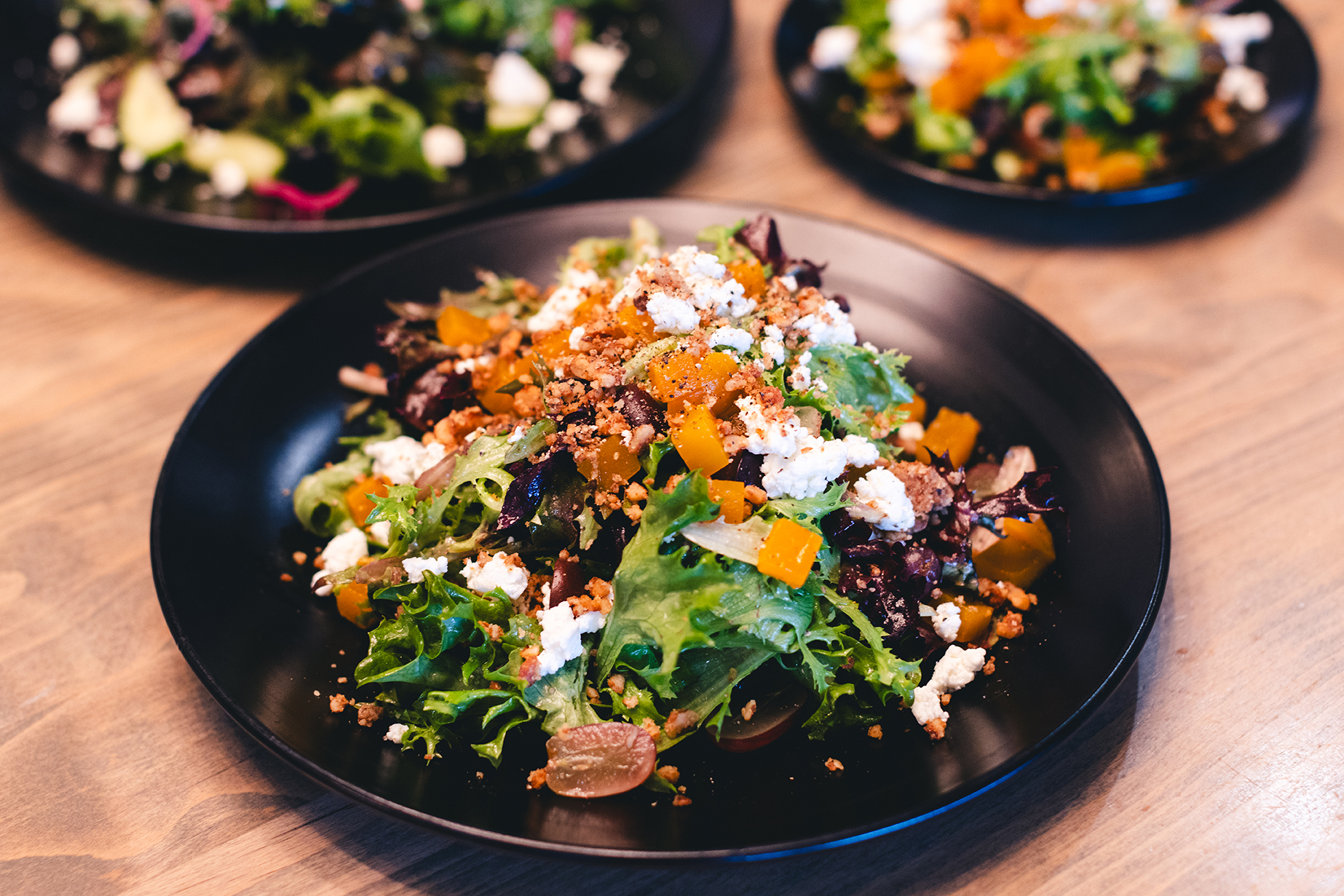 Start your fine dining experience with a light and fresh salad at FINN. – FINN