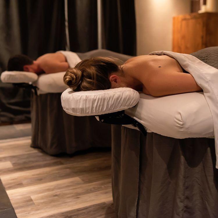 Enjoy a couples massage at the Spas at the Lodge at Whitefish Lake and Firebrand Hotel