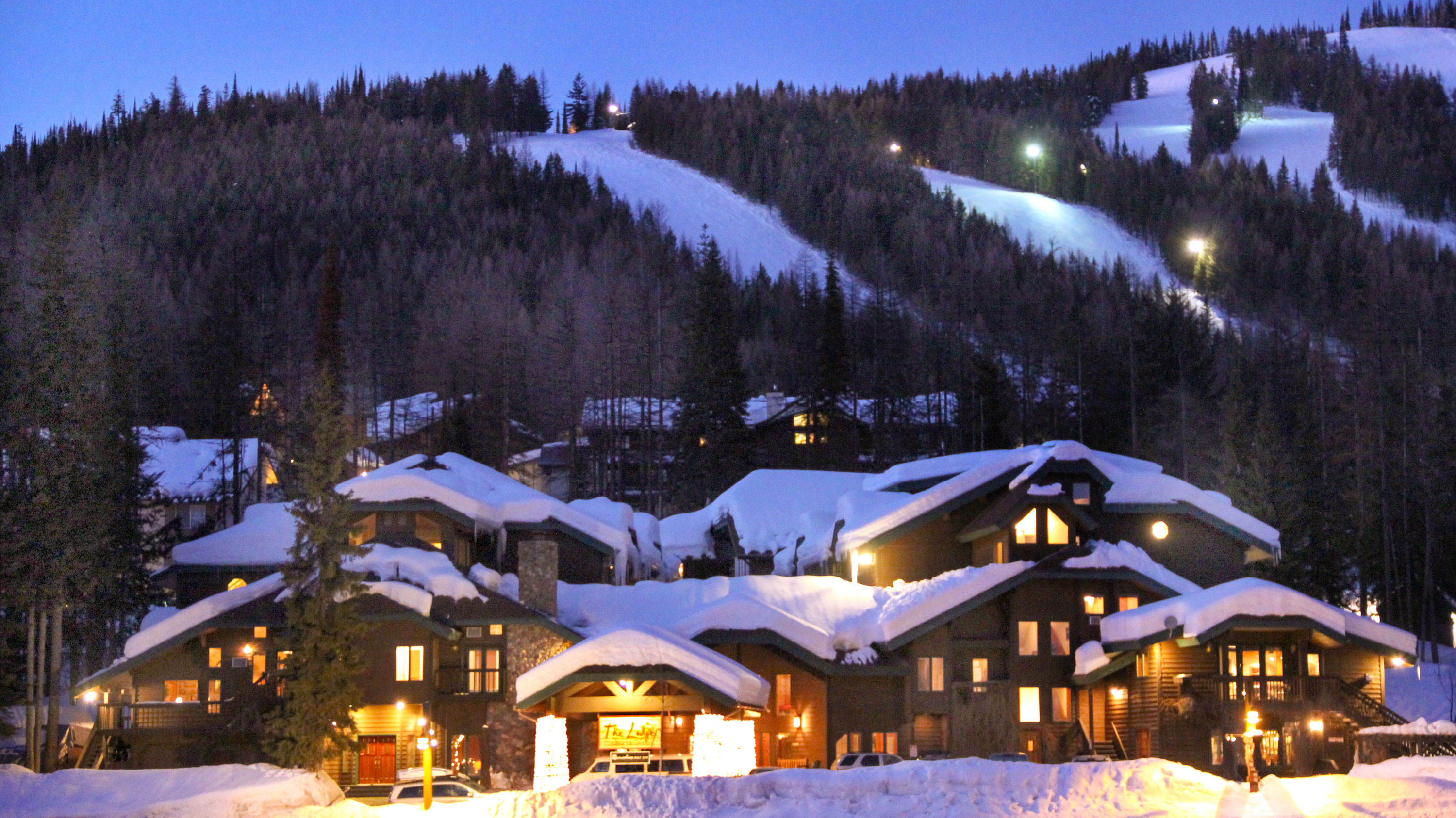 Winter is coming, snow falls on Whitefish Mountain Resort village.