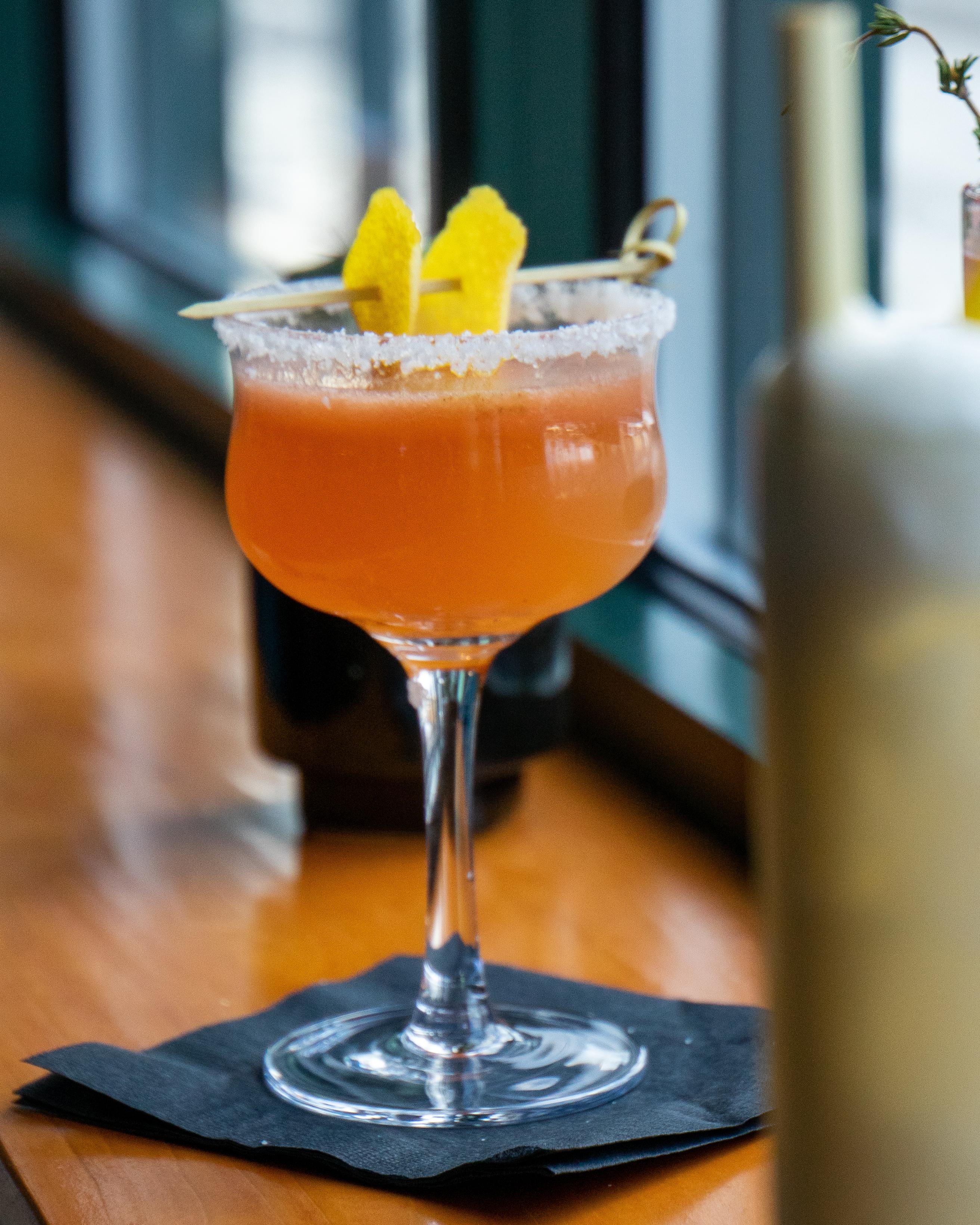 hand-crafted cocktails featuring fresh squeezed juices & fresh herbs, pictured: Salt + Pepper martini