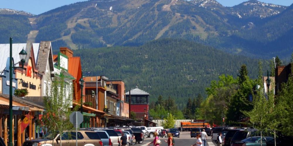 The peak of Big Mountain, home to Whitefish Mountain Resort, provides a scenic backdrop for downtown Whitefish. – Brian Schott
