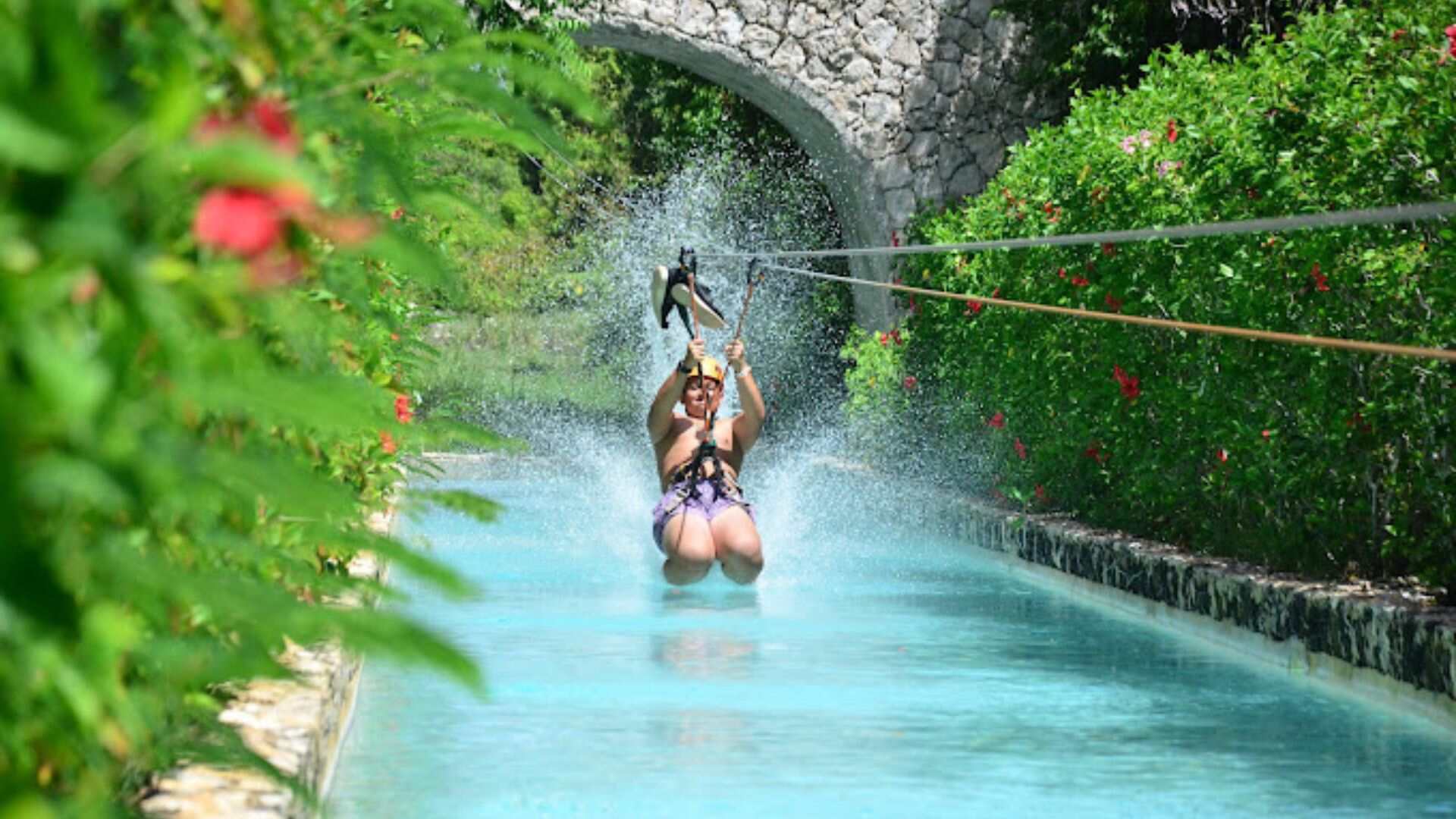 Ziplining over a cenote.