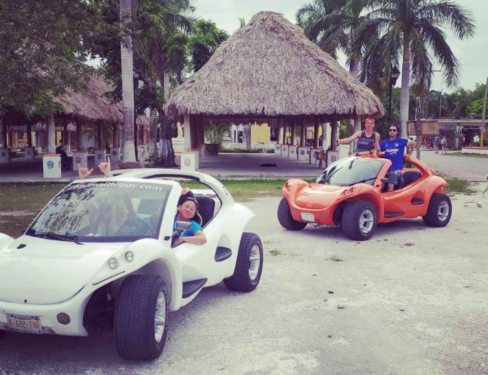 people driving buggies in tropical Cozumel