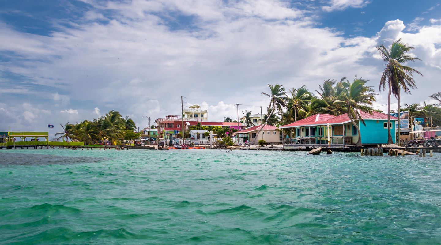 Colorful waterfront buildings seen from the sea. 