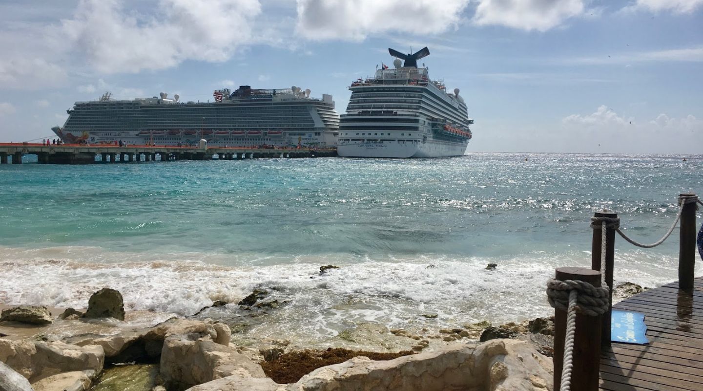 A large cruise ship waits by the cruise port