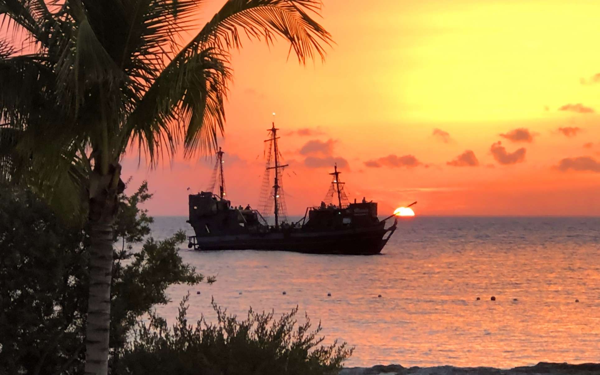cozumel ship with sunset behind int