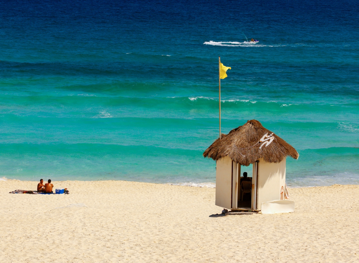 A hut on a beach.