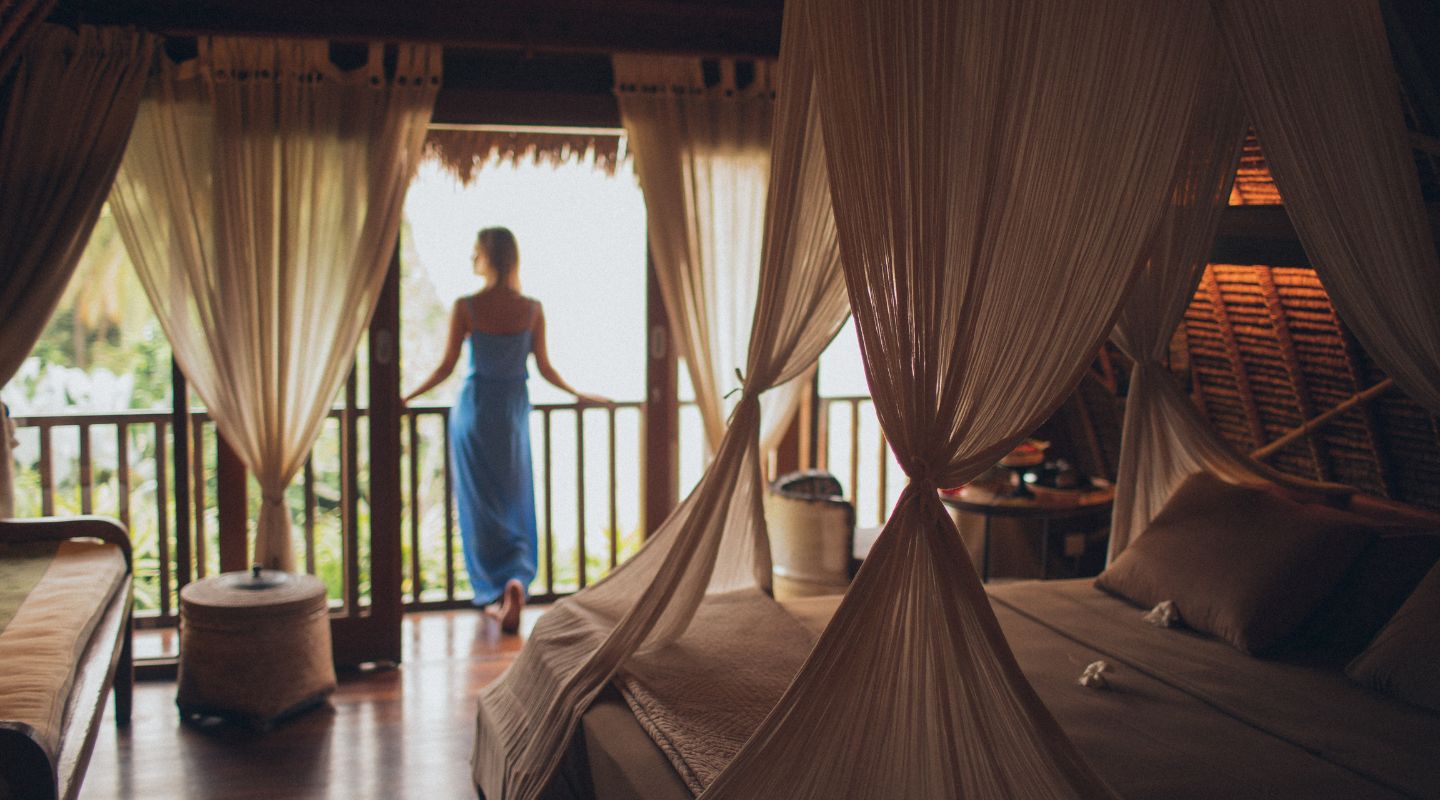 Woman looking out a window.