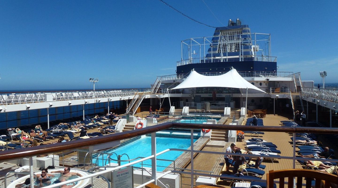 Pool cruise, with people lounging around the pool. 