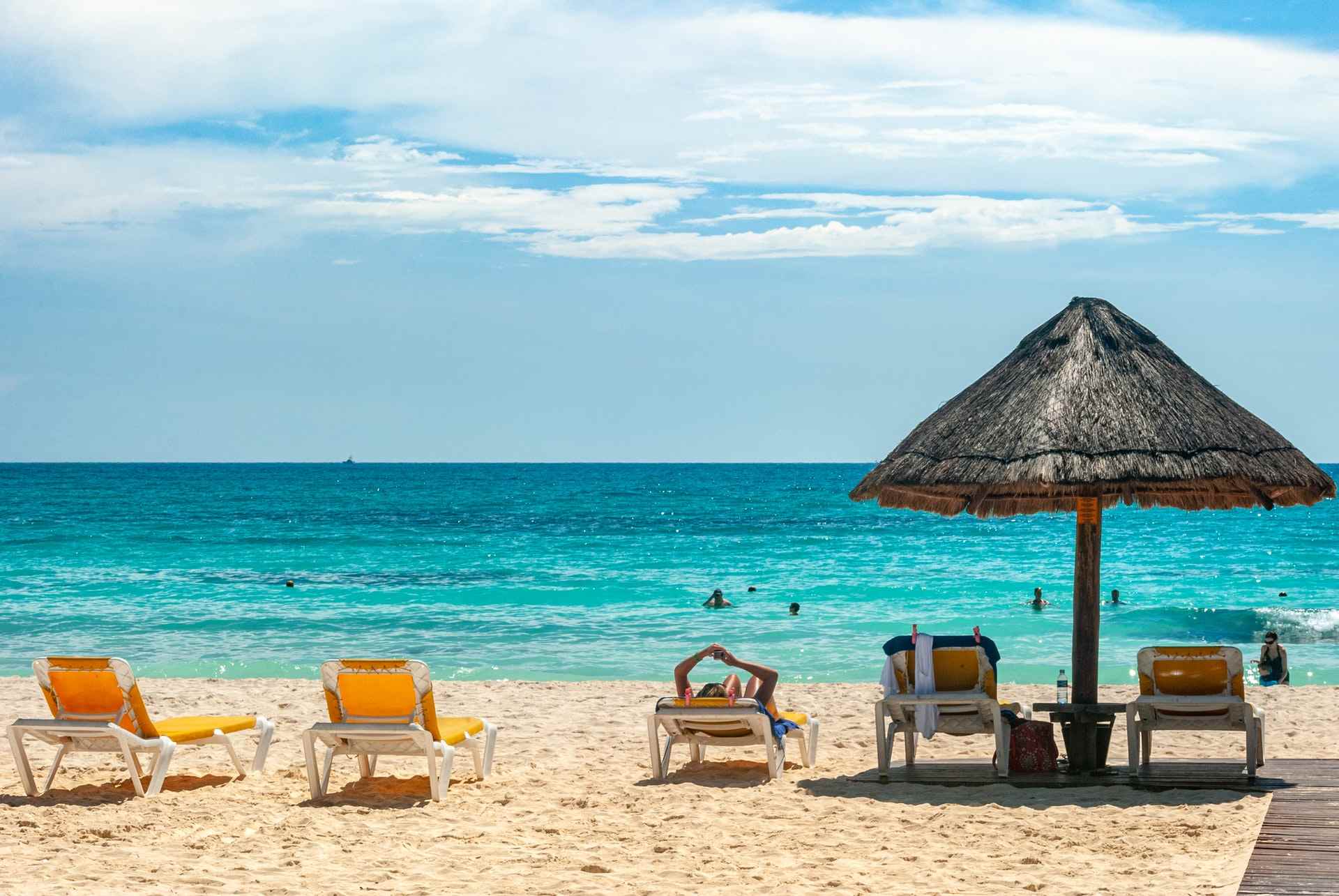 cancun beach with sea in the background