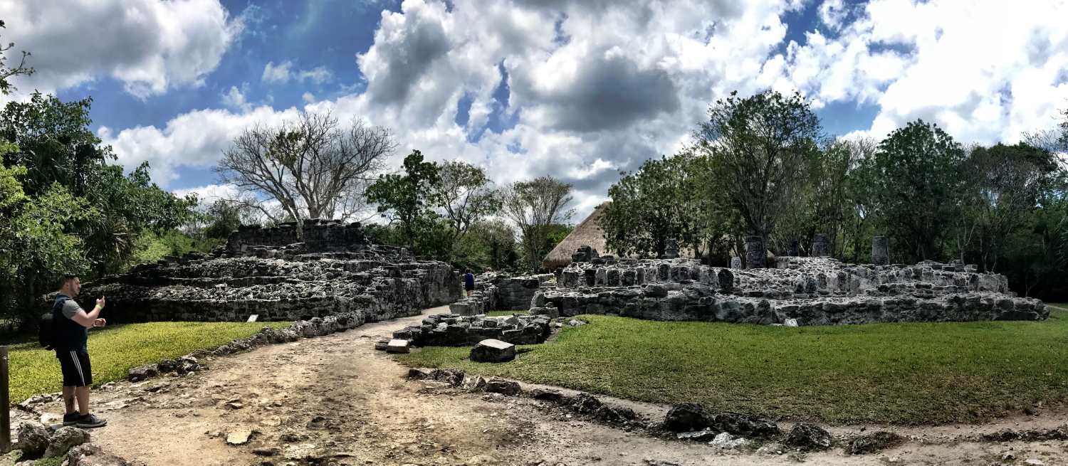 man in the Mayan ruins on Cozumel