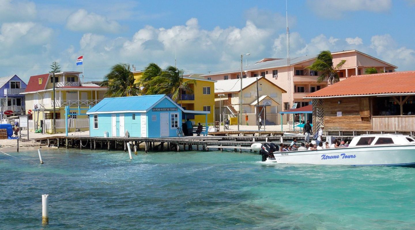 Photo of colorful buildings seen from the shore. 