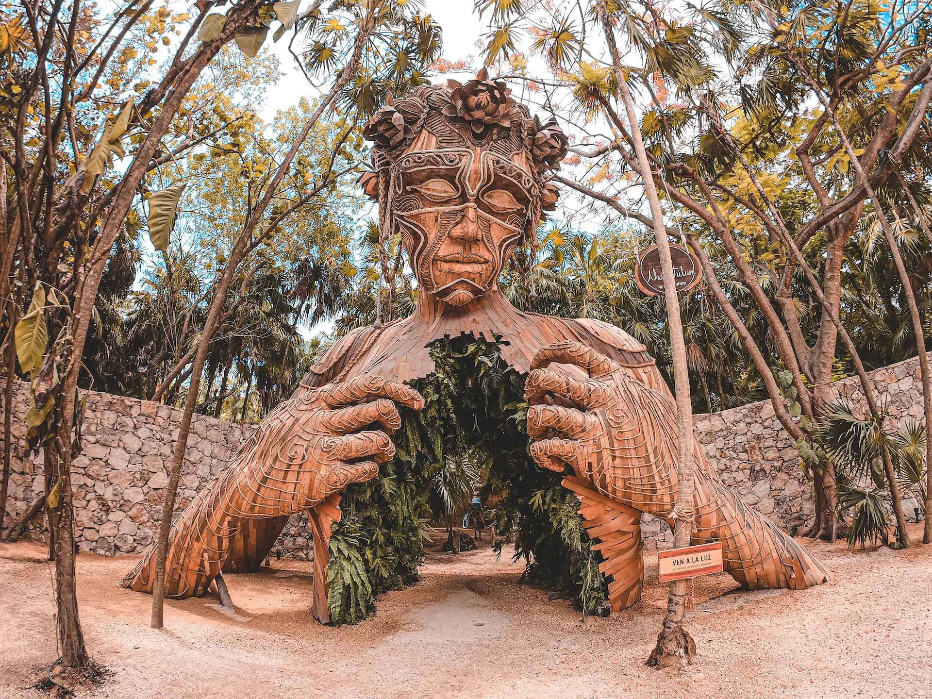 A wooden statue in Tulum.