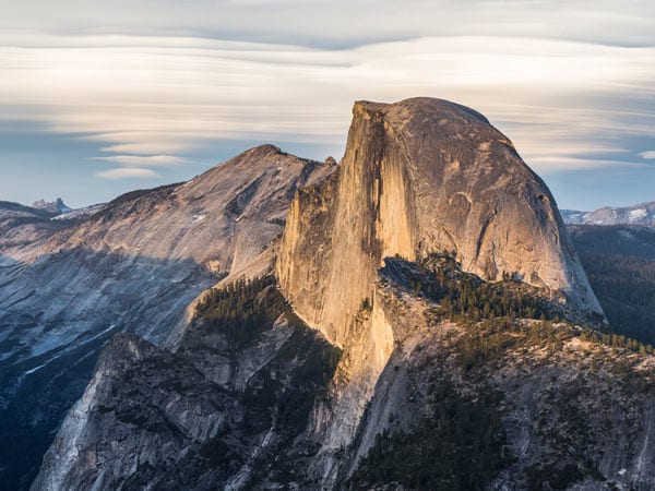 Many important geologic features, such as Yosemite’s Half Dome, would look quite different if it weren’t for the slow-and-steady work of glaciers.