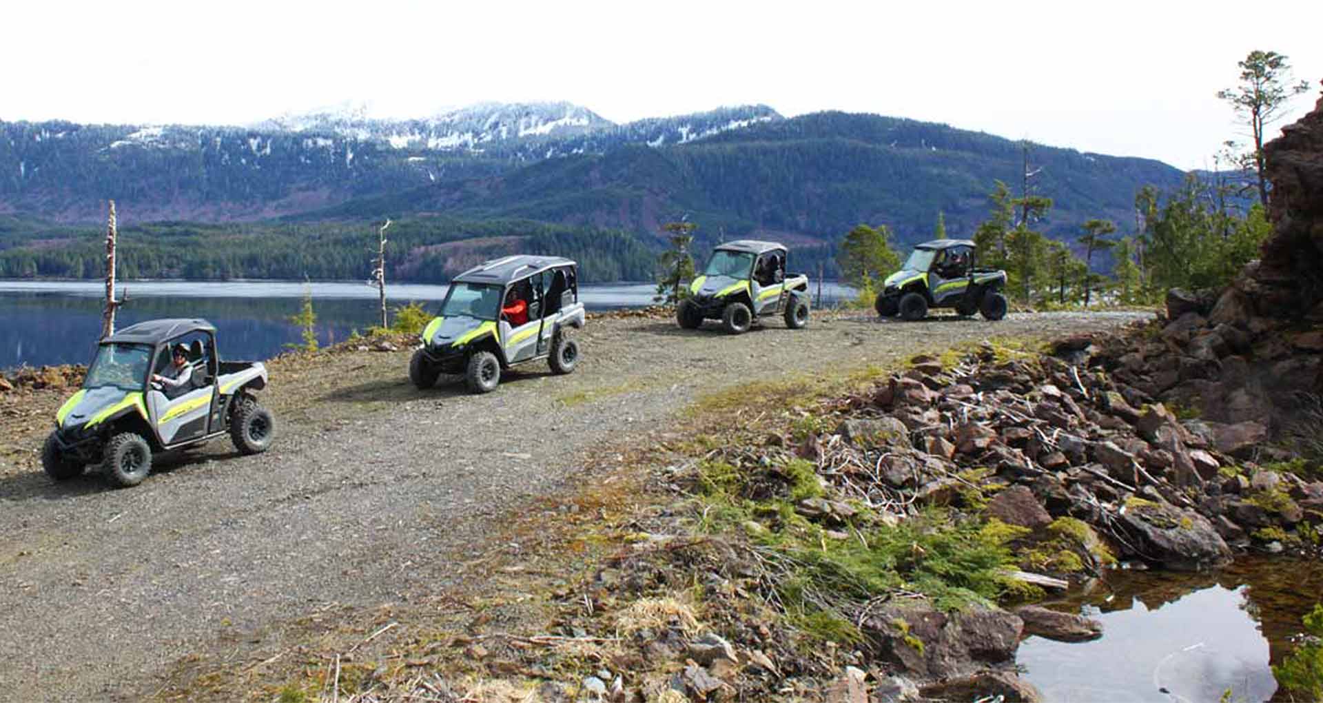 UTVs navigate a scenic off-road trail through the lush forest of Ketchikan, Alaska. Courtesy Ketchikan Shore Tours.