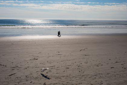 couple walking on York beach