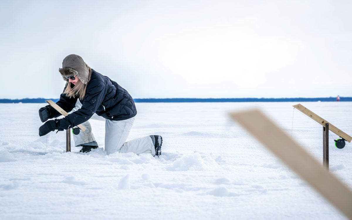 Ice fishing with tip-ups on Sebago Lake