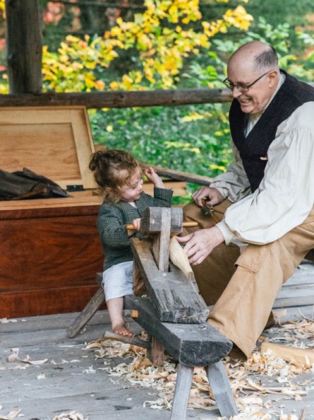 Woodworker and his apprentice.