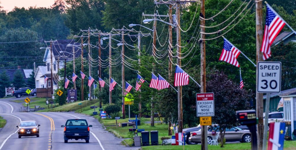 The American flag are a summer tradition on Main Street in most of the Aroostook County towns.