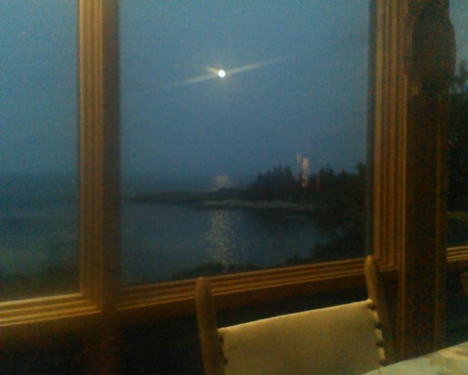Moonrise over Fox Island from the dining table.