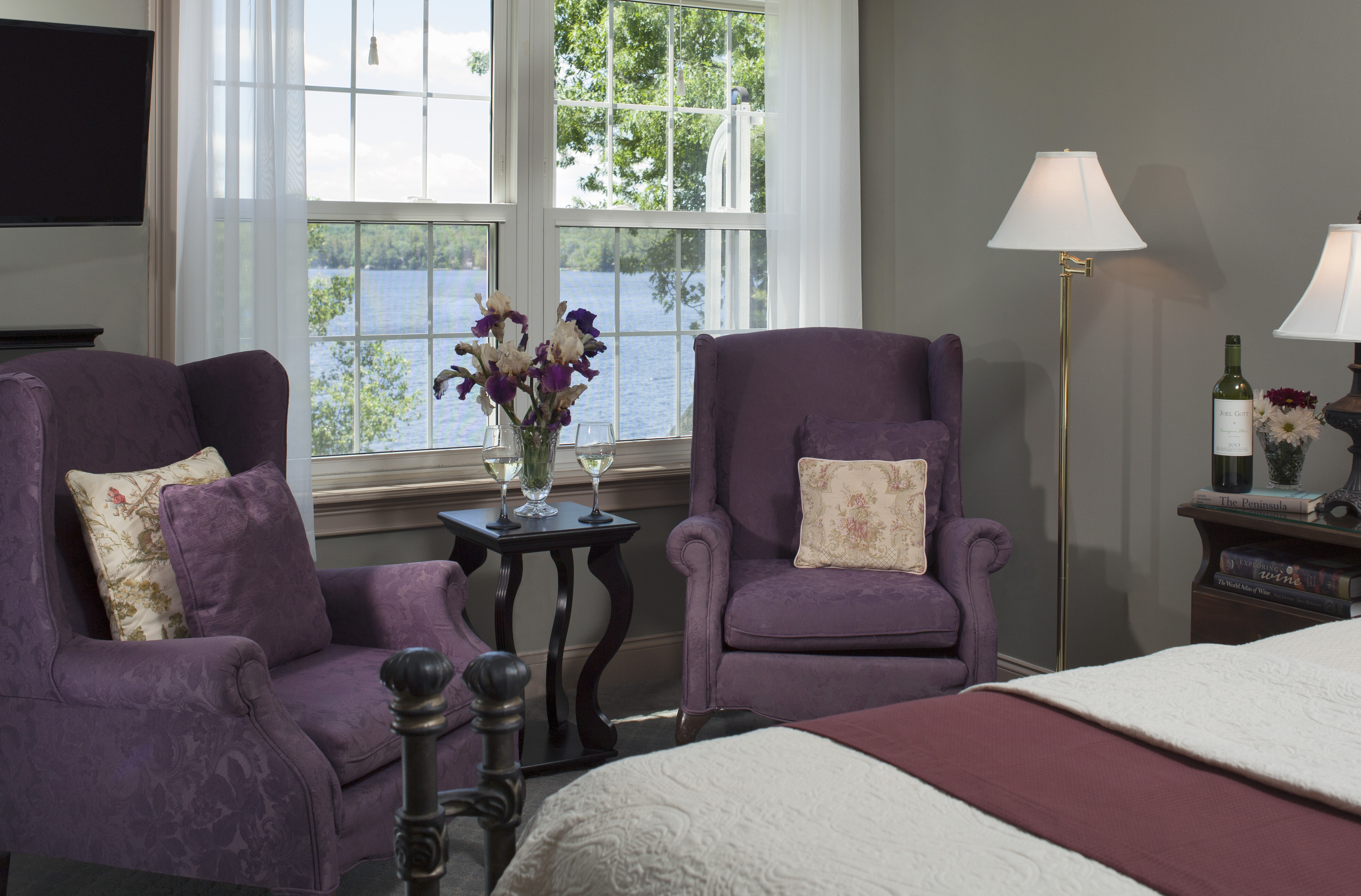 Relax with a good book and great views of Tripp Lake in our Cadillac Mountain suite.