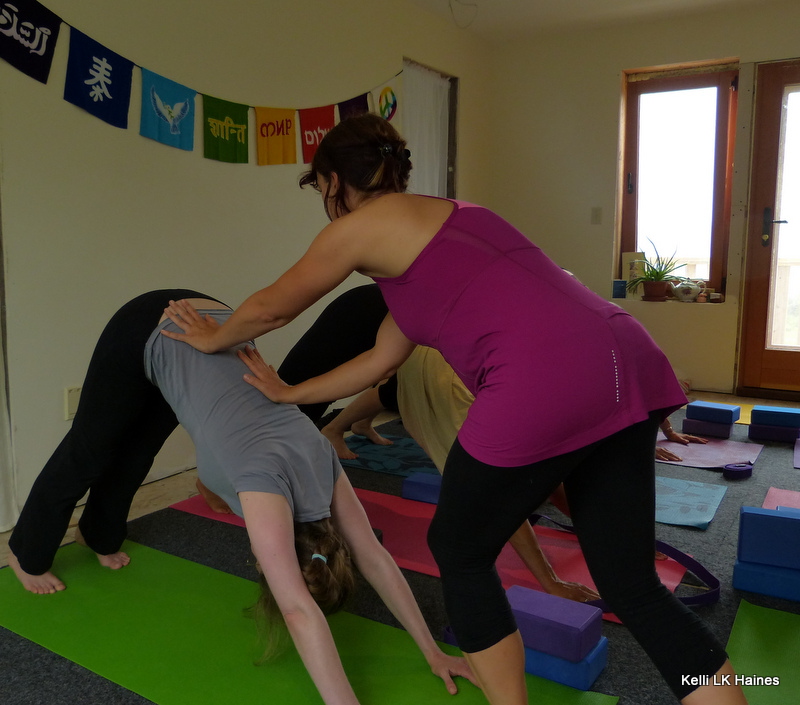 Tara Hire gives gentle hands-on assists.