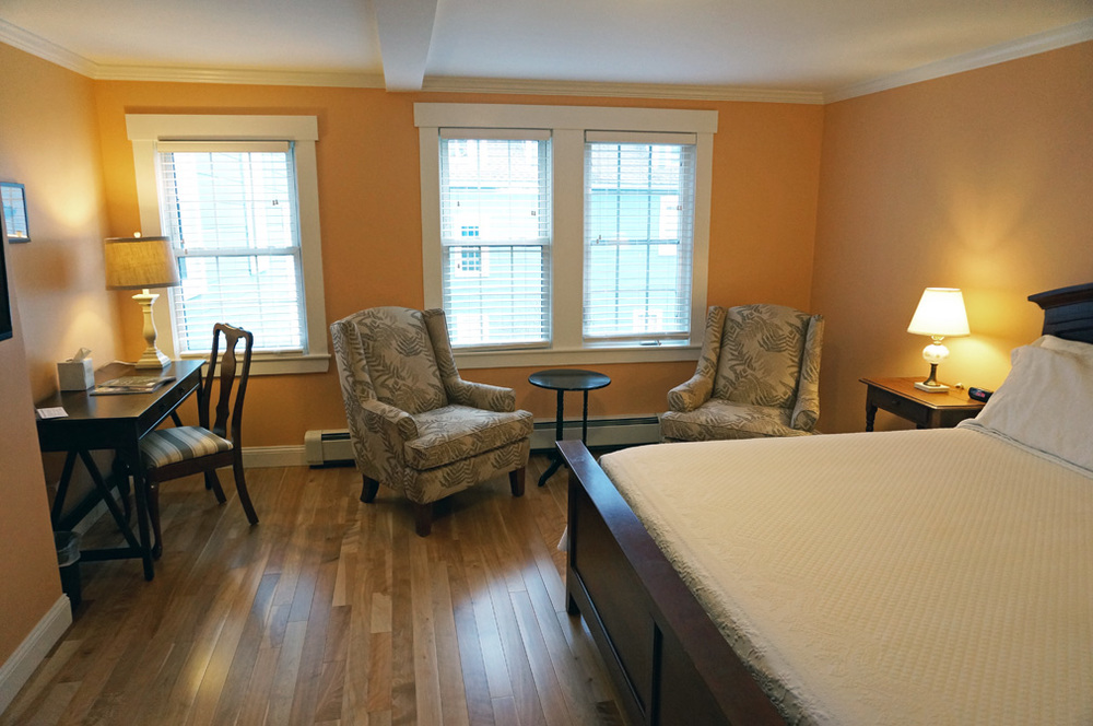 Our newly renovated rooms offer modern amenities with traditional decor.