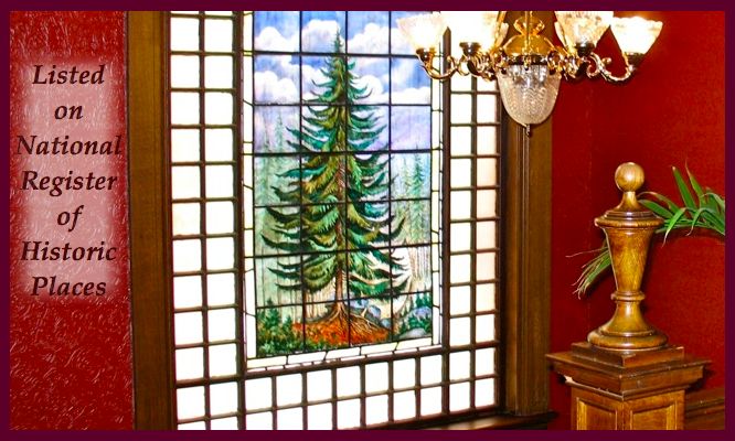 Original 1890 hand-painted leaded glass window of blue spruce tree still adorns the staircase