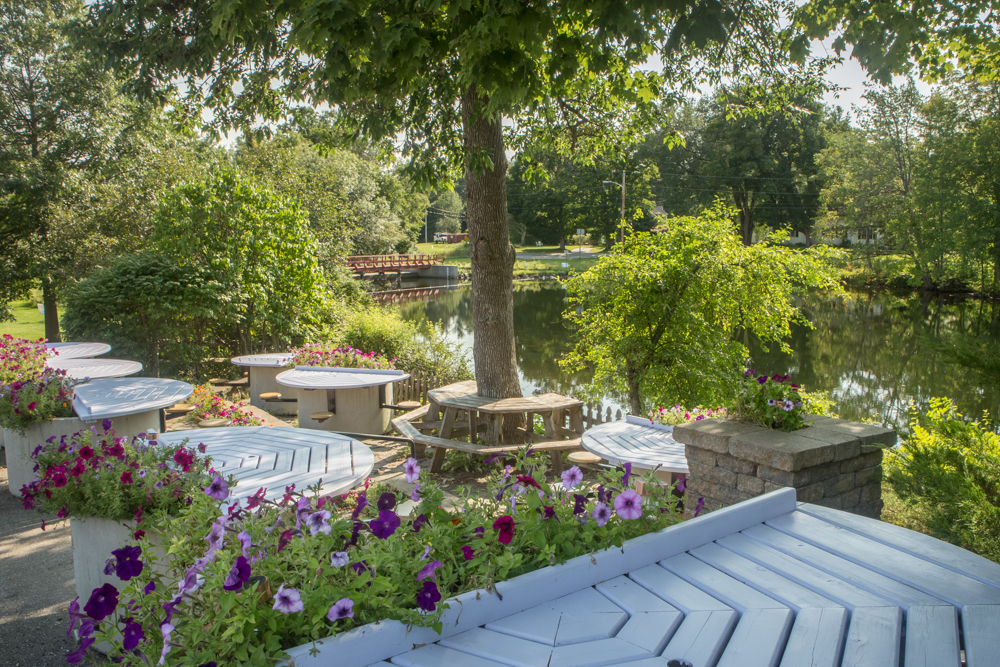 Sit and relax beside the Mill Pond at our waterside patio.