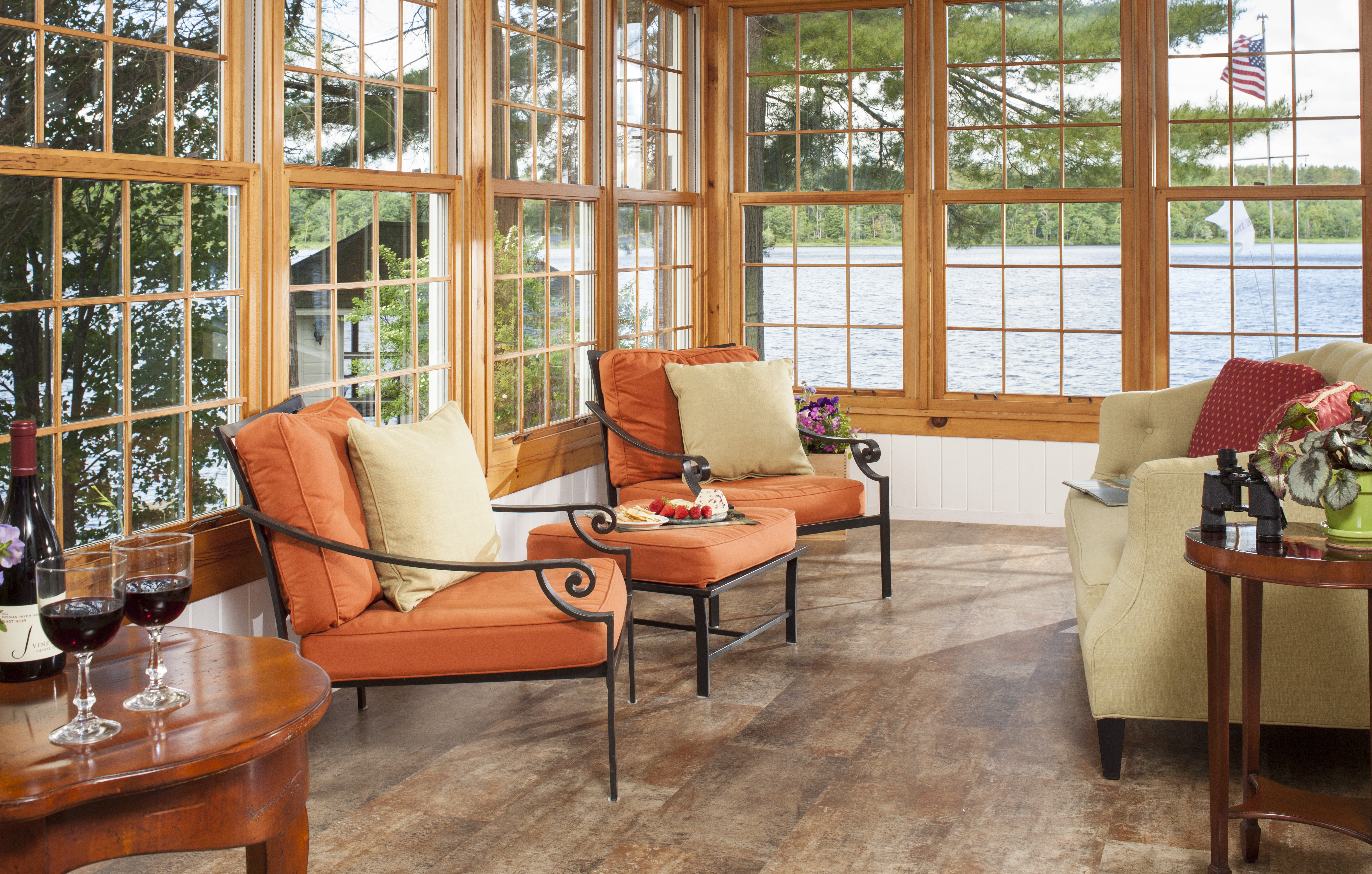 Relax with a good book, a glass of wine and some cheese in our sun porch overlooking Tripp Lake.
